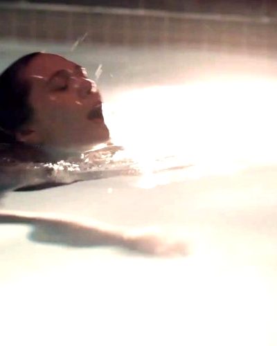 Elizabeth Olsen Climbing Out Of The Pool In A Bikini